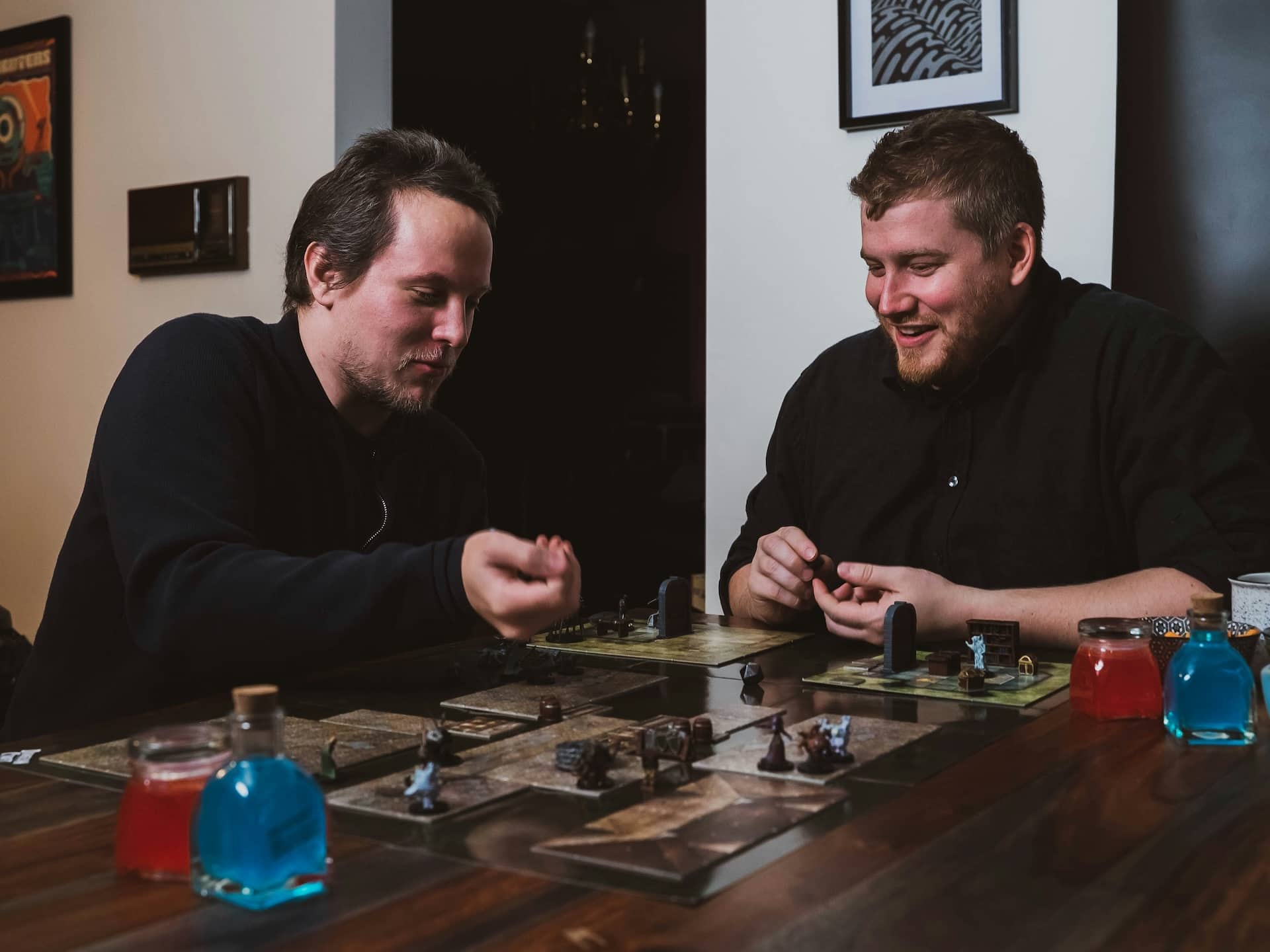 Adults playing D&D with miniatures
